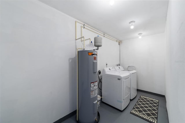 laundry room with independent washer and dryer and electric water heater