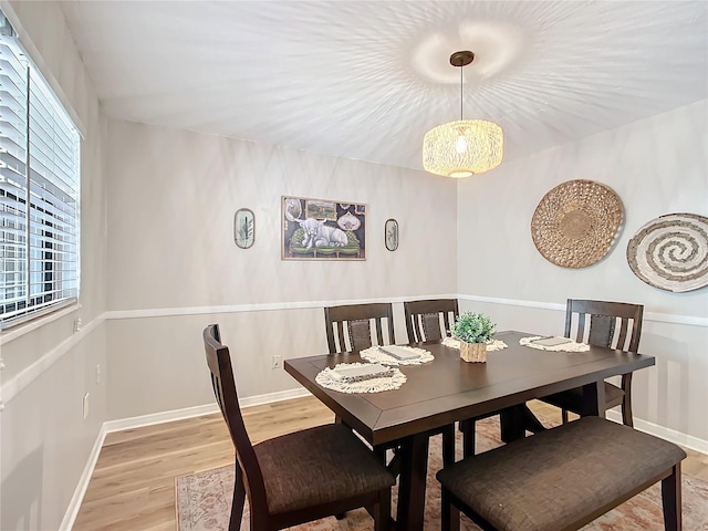 dining area with light wood-type flooring