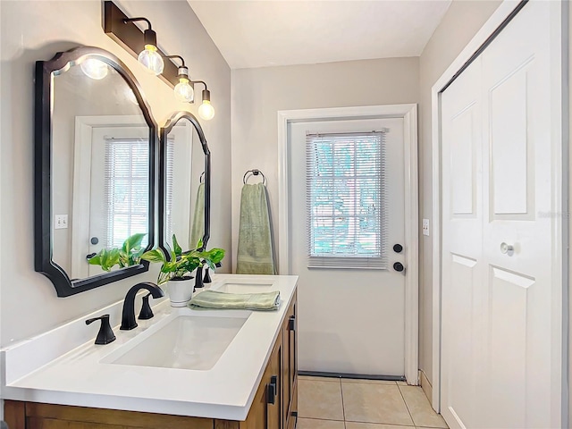 bathroom with vanity and tile patterned floors