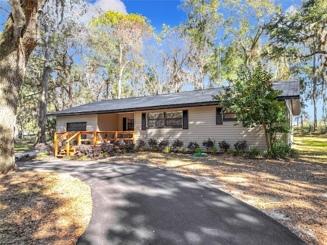 view of front of home with a deck