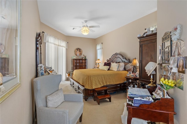 bedroom with multiple windows, carpet flooring, and ceiling fan