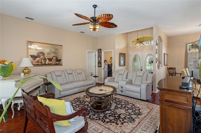 living room featuring french doors, dark hardwood / wood-style floors, and ceiling fan