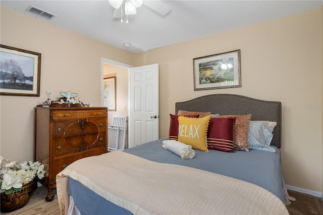 bedroom featuring ceiling fan and carpet flooring