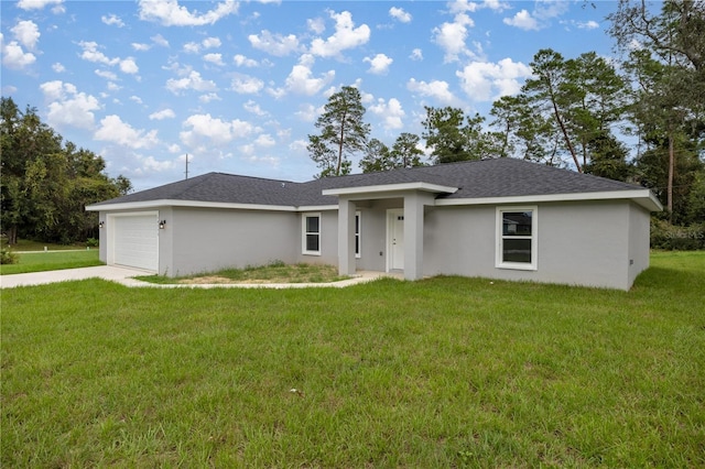 single story home featuring a front lawn, an attached garage, driveway, and stucco siding