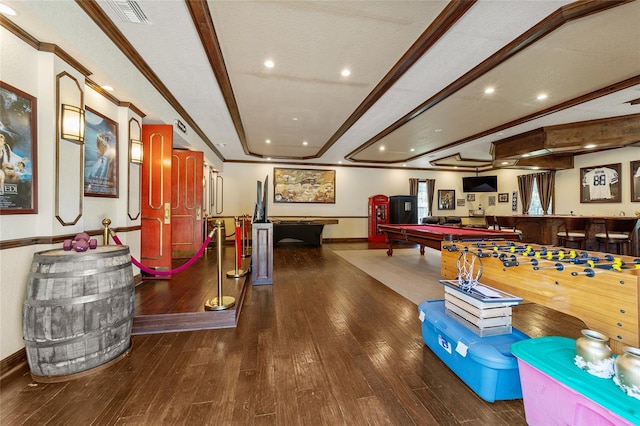 rec room with ornamental molding, pool table, and dark hardwood / wood-style floors