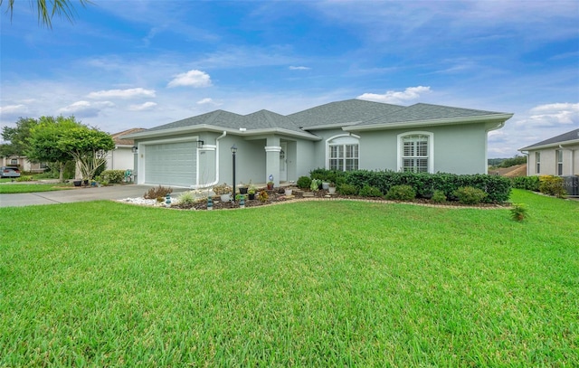 view of front facade featuring a front yard and a garage