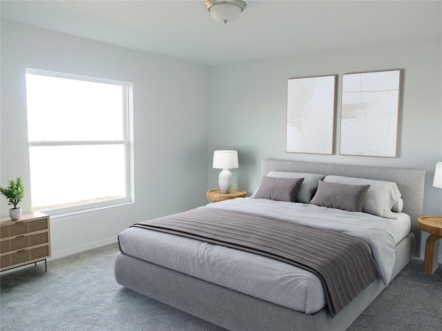 bedroom with baseboards and carpet flooring