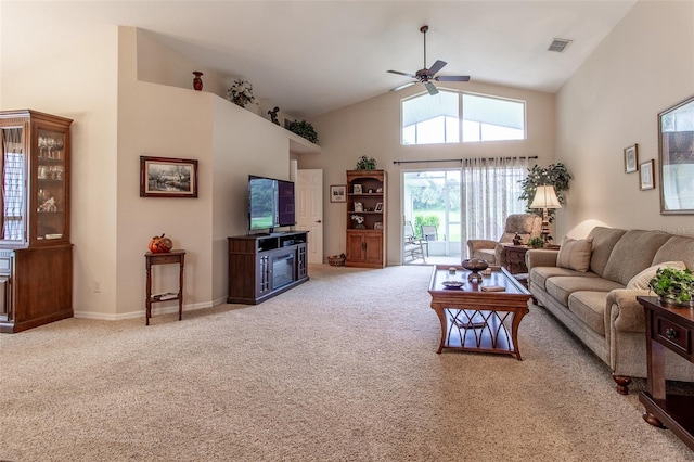 carpeted living room featuring ceiling fan and high vaulted ceiling