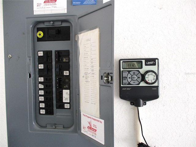 utility room featuring electric panel