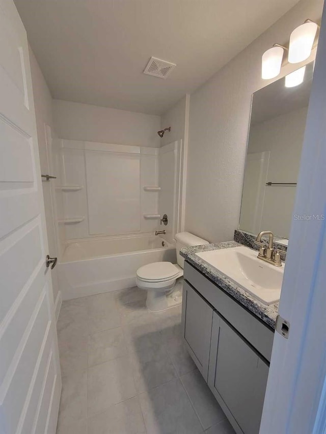 full bathroom featuring toilet, vanity, and bathtub / shower combination