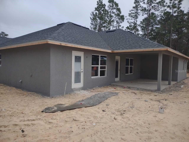 rear view of property with a patio