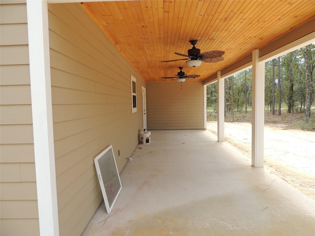 view of patio featuring ceiling fan