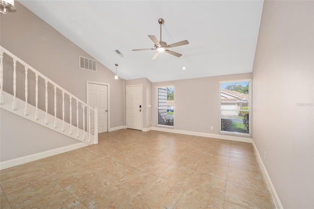 unfurnished living room featuring ceiling fan and high vaulted ceiling