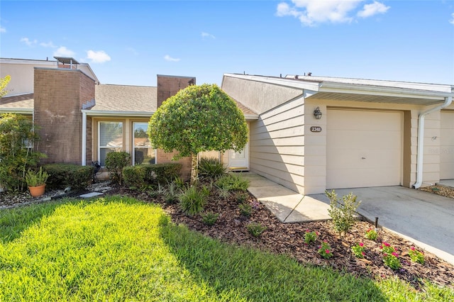 single story home featuring a garage