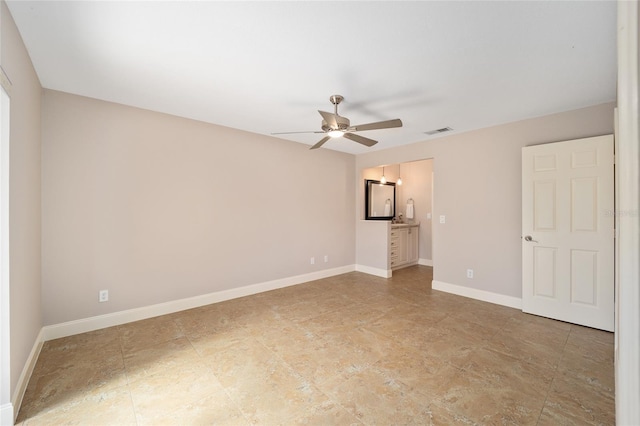 unfurnished room featuring ceiling fan