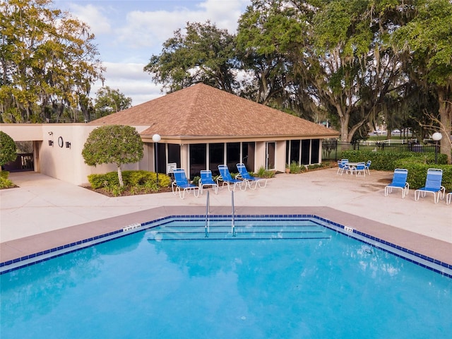 view of pool featuring a patio area