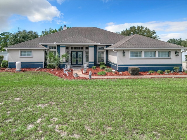 single story home with a front yard