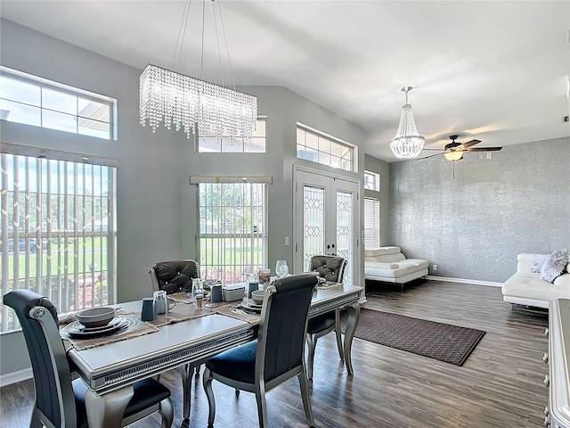 dining space with wood-type flooring and ceiling fan