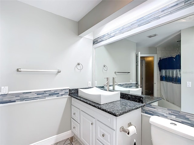 full bathroom featuring shower / tub combo, decorative backsplash, vanity, tile patterned flooring, and toilet