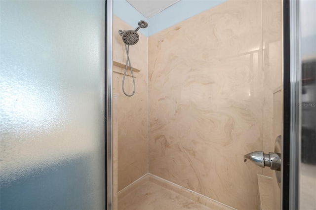 bathroom featuring wooden walls and tiled shower