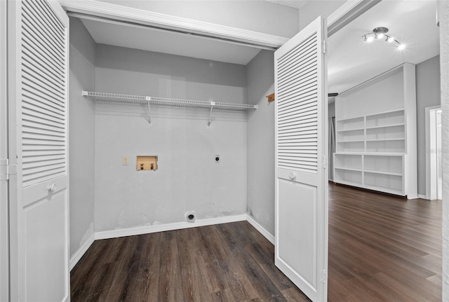 clothes washing area with hookup for an electric dryer, dark wood-type flooring, and washer hookup