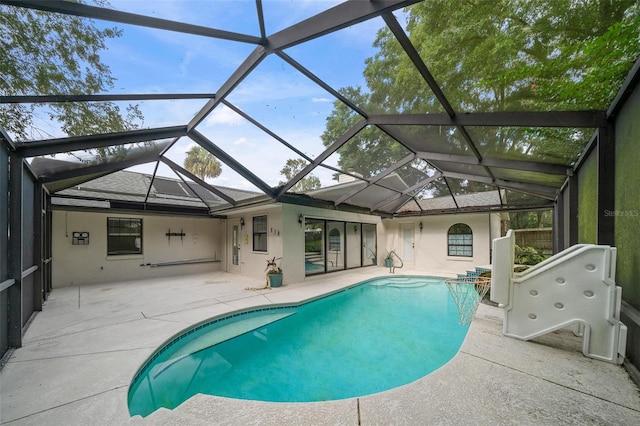 view of pool featuring a patio area and a lanai