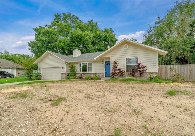 ranch-style house with a garage