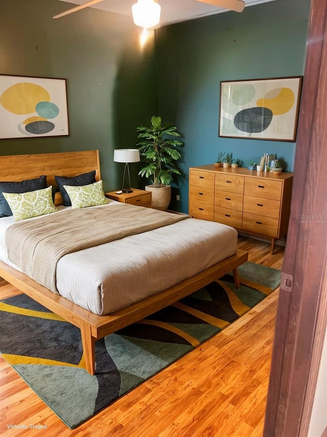 bedroom featuring hardwood / wood-style floors