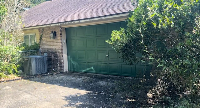 garage featuring central AC unit