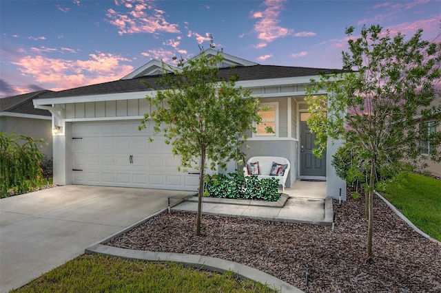 view of front of property featuring a garage