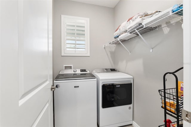 laundry area with washer and clothes dryer