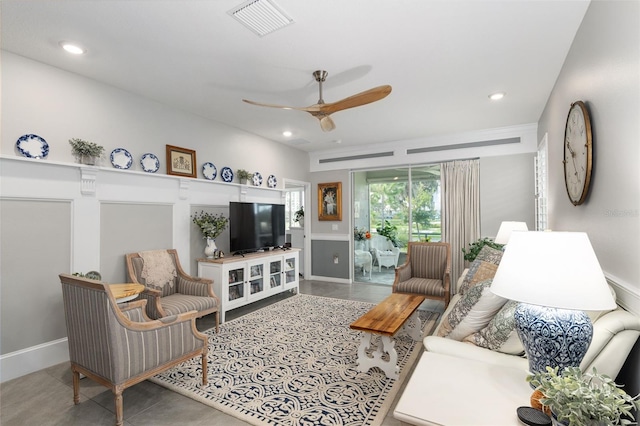 living room featuring ceiling fan