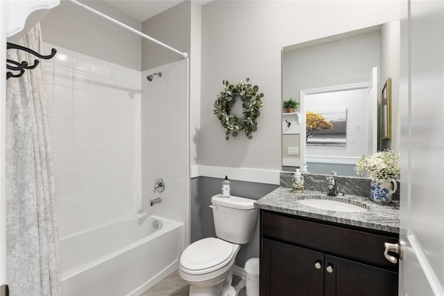 full bathroom with toilet, vanity, and shower / bath combination with curtain