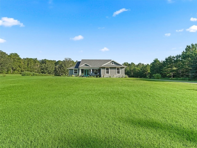 ranch-style home with a front yard