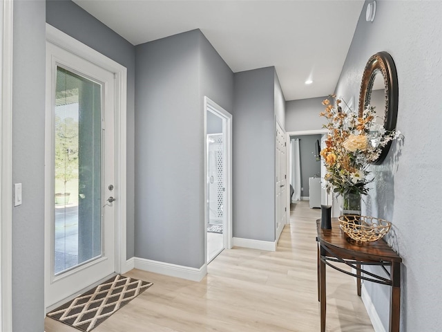 doorway featuring light wood-type flooring