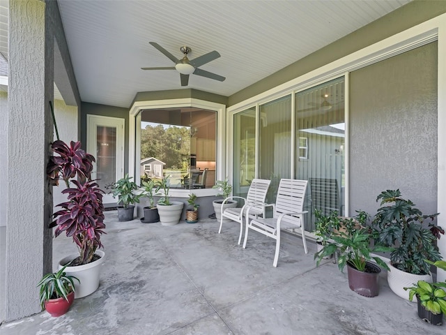 view of patio / terrace featuring ceiling fan