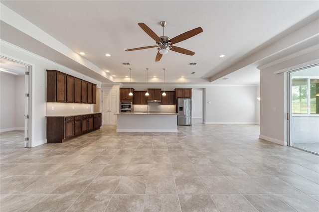 unfurnished living room featuring ceiling fan and light tile patterned flooring