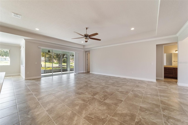 tiled empty room with ornamental molding, a textured ceiling, and ceiling fan