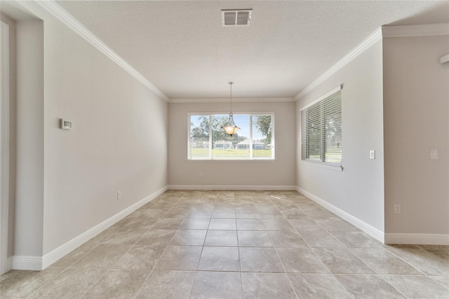 unfurnished dining area featuring a textured ceiling, crown molding, and light tile patterned flooring