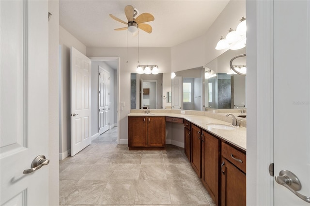 bathroom with ceiling fan and vanity