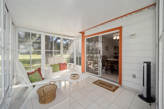 sunroom / solarium with ceiling fan