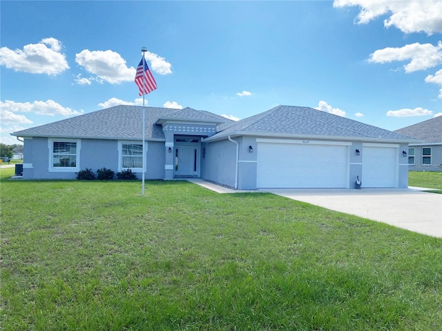 single story home with a garage and a front yard