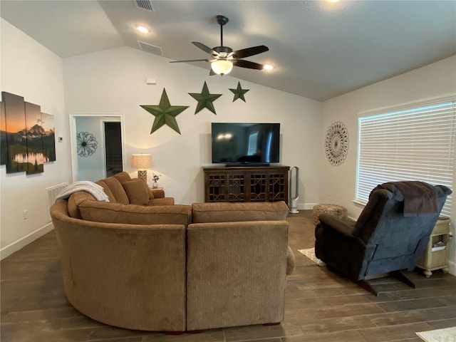 living room featuring ceiling fan, lofted ceiling, and dark hardwood / wood-style floors