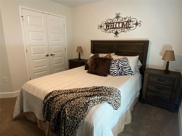 carpeted bedroom featuring a closet