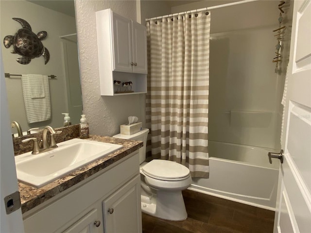 full bathroom with vanity, toilet, hardwood / wood-style floors, and shower / bath combo with shower curtain