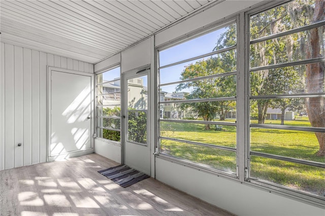 unfurnished sunroom featuring a wealth of natural light