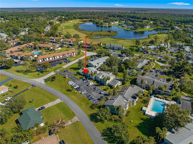 drone / aerial view with a water view