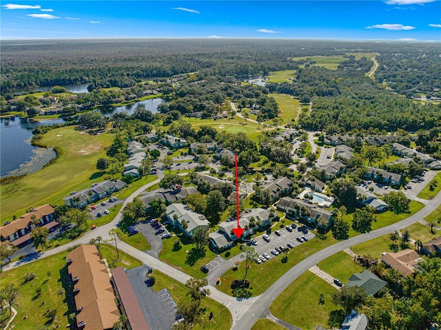 551 Fairways Dr Unit A, Ocala, FL 34472 - drone / aerial view featuring a forest view, a water view, and a residential view