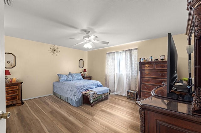 bedroom featuring light hardwood / wood-style flooring and ceiling fan