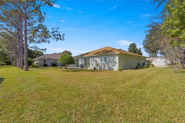 view of yard with a garage